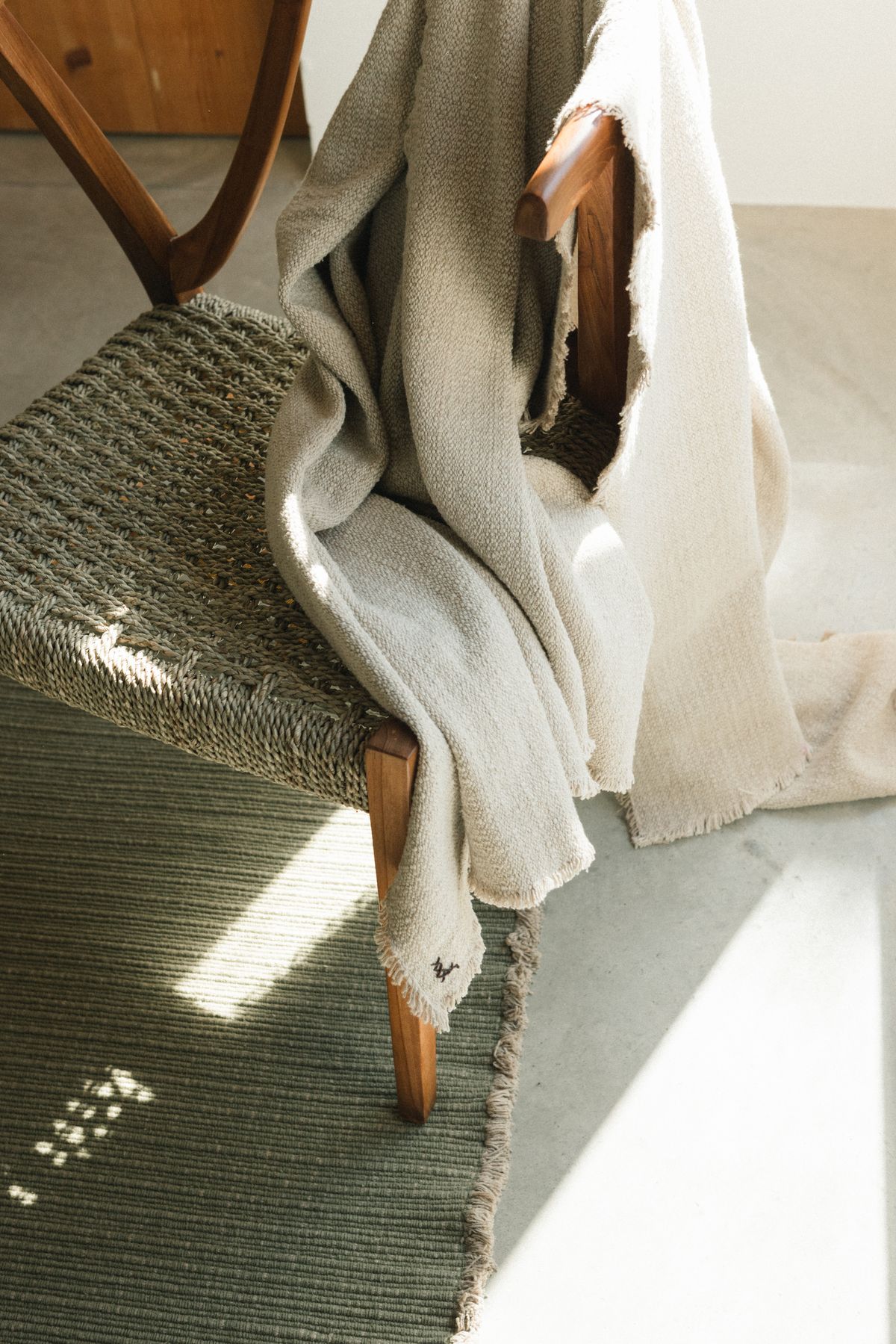 Thoughtfully layered textiles in a relaxed interior